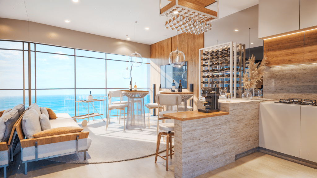 Interior de um apartamento de luxo com vista para o mar, apresentando uma área de estar com sofá e mesa de bar, além de uma cozinha moderna com adega de vinhos. A iluminação suave e os detalhes em madeira criam um ambiente aconchegante.